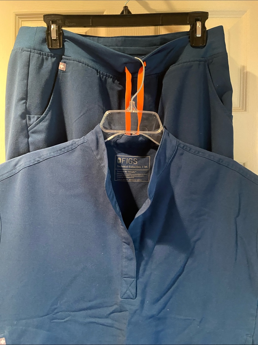 Figs Women’s Navy Blue Scrub Set with Orange Drawstring Accent XS top/ M bottom